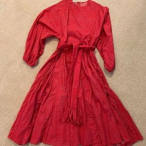 RHODE midi length dress in hot pink with quilted waist belt and blue dots